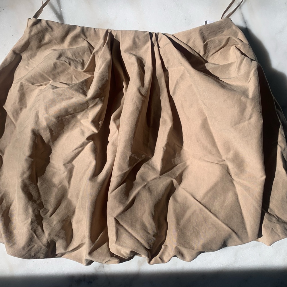 Tan structured/bubble mini skirt
